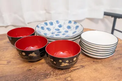 a group of bowls and plates on a table at NEW OPEN! Nearest JR Shinokubo and JR soubu line HIgashinakano, shinjuku 5 minute ginza 25 minute asakusa 35 minute in Tokyo