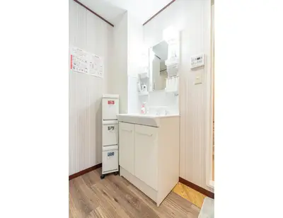 a small bathroom with a sink and a counter at NEW OPEN! Nearest JR Shinokubo and JR soubu line HIgashinakano, shinjuku 5 minute ginza 25 minute asakusa 35 minute in Tokyo