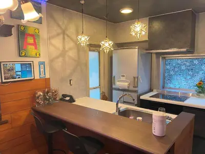 a kitchen with a sink and a counter top at Tatami room & Living Room equipped with Multinational TV and Fire, BBQ corner in Tokyo Downtown House in Tokyo