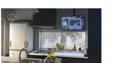 a kitchen with a sink and a window with at Tatami room & Living Room equipped with Multinational TV and Fire, BBQ corner in Tokyo Downtown House in Tokyo