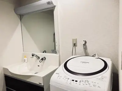 a bathroom with a sink and a mirror at shinjuku Jun7F-SJ0095 in Tokyo