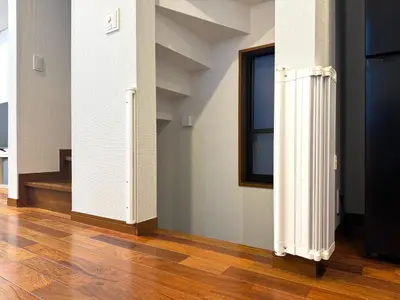 a white radiator in a room with a wooden floor at Minato-ku - House - Vacation STAY 14528 in Tokyo