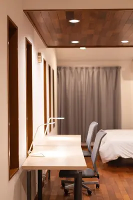 a hospital room with a bed and a table and chairs at Minato-ku - House - Vacation STAY 14528 in Tokyo