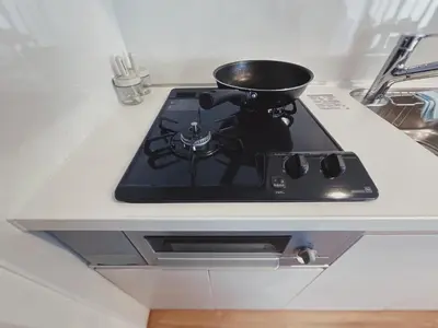 a pot sitting on top of a stove in a kitchen at KUMOMA - Vacation STAY 92923v in Tokyo