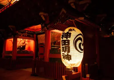 a lit up sign in front of a building at Saka no Hotel Tretio Ochanomizu in Tokyo