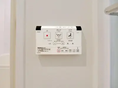 a close up of a door with a sticker on it at Okubo Shinjuku new open Capsule hotel in Tokyo