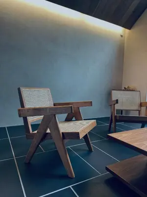 a wooden picnic table and chairs in a room at Kakurega Tokyo villa in Tokyo