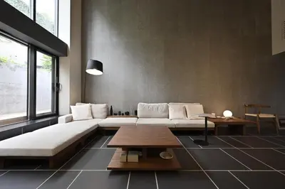 a living room with two white couches and a table at Kakurega Tokyo villa in Tokyo
