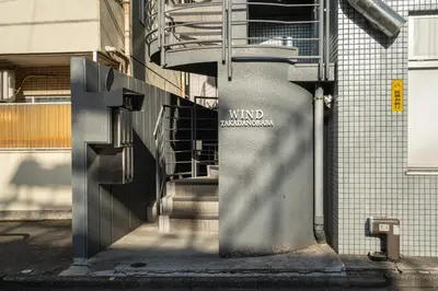 a building with a wall with awwheasternheasternheastern at Two-bedroom, 6-minute walk to the Yamanote Line in Tokyo