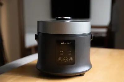 a black appliance sitting on top of a table at LUCKY house53 in Tokyo