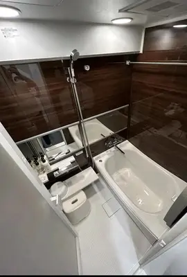 a bathroom with a sink and a toilet at LUCKY house53 in Tokyo