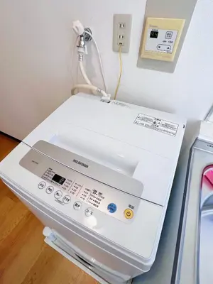 a hospital bed with a machine in a room at Emoto Asakusa in Tokyo