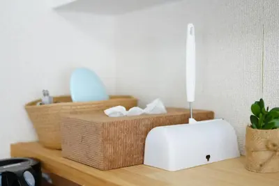 a white toaster sitting on top of a counter with baskets at Kameari 811 Budget Stay High Floor Near Station Mall Disney Access in Tokyo