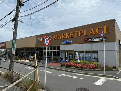 a store front of a market place on a street at FUJIMI TOWN HOUSE in Tokyo