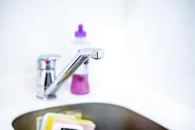 a sink with a toothbrush and a faucet at Shinjuku Ryokan Retreat丶Local Tokyo Experience & Short Trips Hub丶walk to Higahsi Shinjuku station LoE2 in Tokyo
