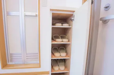 a closet with a pair of shoes in it at \u9591\u9759\u306a\u4f4f\u5b85\u8857_\u6696\u304b\u304f\u5c45\u5fc3\u5730\u306e\u826f\u3044\u30c7\u30b6\u30a4\u30f3 SoW-2 in Tokyo