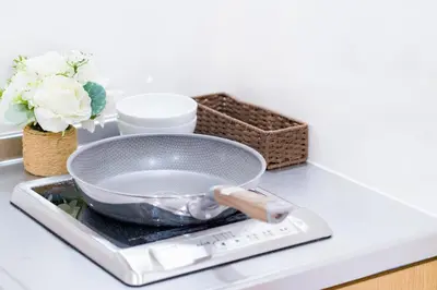 a strainer on a scale on a kitchen counter at 10min walk to Shinjuku YoY5 in Tokyo