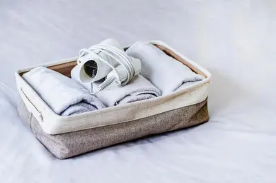 a suitcase filled with towels and a gas mask at 10min walk to Shinjuku YoY5 in Tokyo
