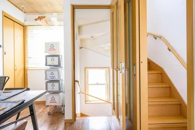 a staircase in a room with a stair case at Premier suite Shibuya Yoyogi front in Tokyo