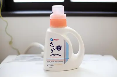 a bottle of milk sitting on top of a desk at ks\u897f\u65e9\u7a32\u7530 in Tokyo