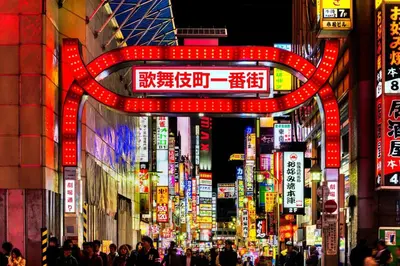 a busy city street with many signs and people at Tokyo Central Shinjuku-ward Japanese Tatami House 2DK-\u65b0\u5bbf03 in Tokyo