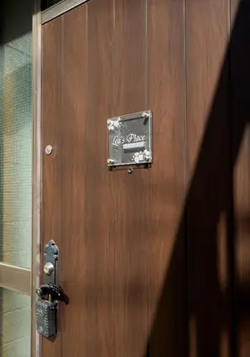 a wooden door with a sign that says office garage at Tokyo Central Shinjuku-ward Japanese Tatami House 2DK-\u65b0\u5bbf03 in Tokyo