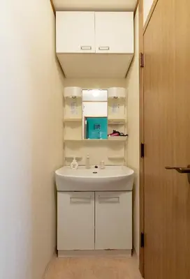 a bathroom with a white sink and a mirror at Tokyo Central Shinjuku-ward Japanese Tatami House 2DK-\u65b0\u5bbf03 in Tokyo