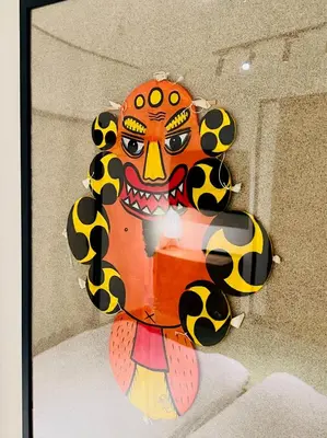 a painting of a clown on display in a museum at Ueno Retro Flower - Ueno Okachimachi in Tokyo