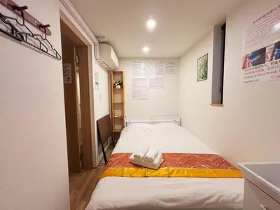 a small room with a bed in a room at Hananogo Ikebukuro - Vacation STAY 09224v in Tokyo