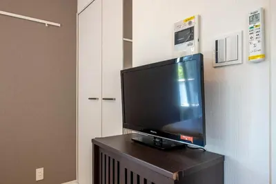 a flat screen tv sitting on top of a table at \u6e0b\u8c37\u30d2\u30eb\u30c8\u30c3\u30d7 in Tokyo