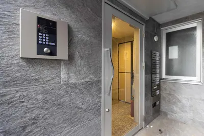 a bathroom with a walk in shower next to a door at R\u30ca\u30ec\u30c3\u30b8\u4e21\u56fd bldg in Tokyo