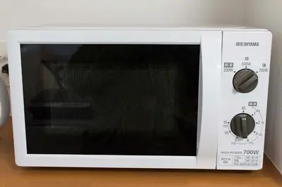 a white microwave oven with its door open at \u30d5\u30ed\u30fc\u30ea\u30c3\u30b7\u30e521 in Tokyo