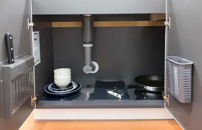 a kitchen with a stove and some dishes at \u30d5\u30ed\u30fc\u30ea\u30c3\u30b7\u30e521 in Tokyo