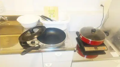 two pots and pans sitting on a kitchen counter at Hananogo Ikebukuro - Vacation STAY 16082v in Tokyo