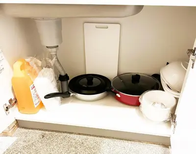 a kitchen counter with bowls and other kitchen utensils at Hananogo Ikebukuro - Vacation STAY 16082v in Tokyo