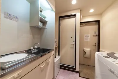 a bathroom with a sink and a toilet at \u30f4\u30a3\u30f3\u30c6\u30fc\u30b8\u30c7\u30b6\u30a4\u30f3\u795e\u697d\u5742 in Tokyo