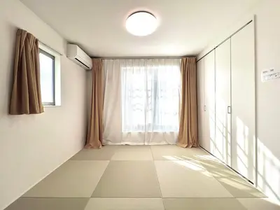 an empty hallway with a large window and curtains at Tokyo QY TT0431 in Tokyo
