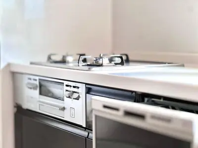 a kitchen with a stove and a microwave at Tokyo QY TT0431 in Tokyo