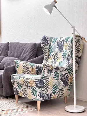 a living room with a couch and a chair with a lamp at Tokyo QY TT0431 in Tokyo
