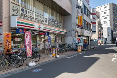 a group of bikes parked in front of a building at \u30c8\u30ea\u30a2\u30b9540 in Tokyo