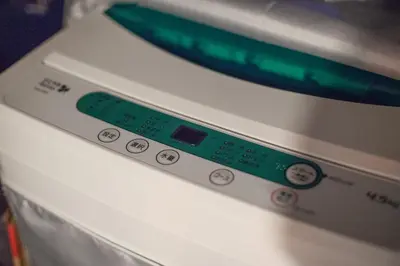 a close up of a wii remote control at \u30b5\u30f3\u30d1\u30ec\u30b9\u897f\u65b0\u5bbf in Tokyo