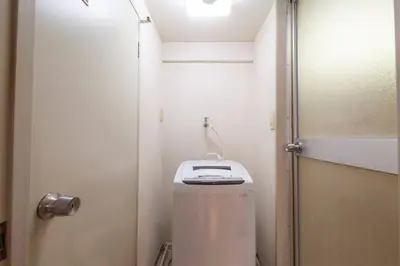 a small bathroom with a toilet with a sink at \u30b7\u30e3\u30c8\u30ec\u897f\u5927\u4e95 in Tokyo
