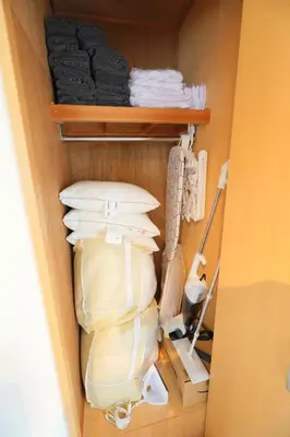a closet filled with pillows and other items at \u30ab\u30fc\u30b5\u30de\u30c4\u30d0\u30e9 in Tokyo