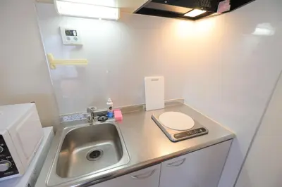 a small bathroom with a sink and a toilet at \u30ab\u30fc\u30b5\u30de\u30c4\u30d0\u30e9 in Tokyo