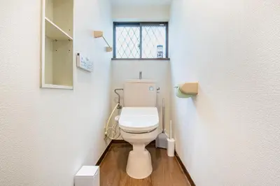 a bathroom with a white toilet in a room at \u5e61\u30f6\u8c373\u4e01\u76ee\u6238\u5efa in Tokyo