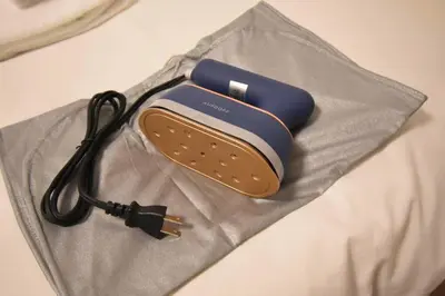 a phone sitting on top of a piece of cloth at \u6771\u99d2\u5f62201 in Tokyo