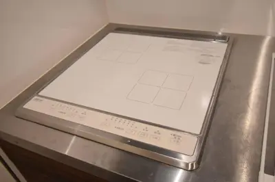 a scale sitting on top of a metal table at \u6771\u99d2\u5f62203 in Tokyo