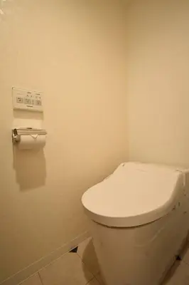 a bathroom with a white toilet in a room at \u6771\u99d2\u5f62203 in Tokyo