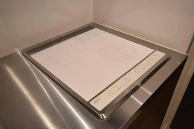 a drawer in a refrigerator with a paper in it at \u6771\u99d2\u5f62402 in Tokyo