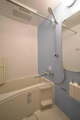 a bathroom with a shower and a toilet in it at \u6771\u99d2\u5f62402 in Tokyo